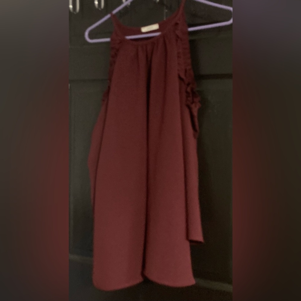 Elegant Burgundy blouse with open shoulders.